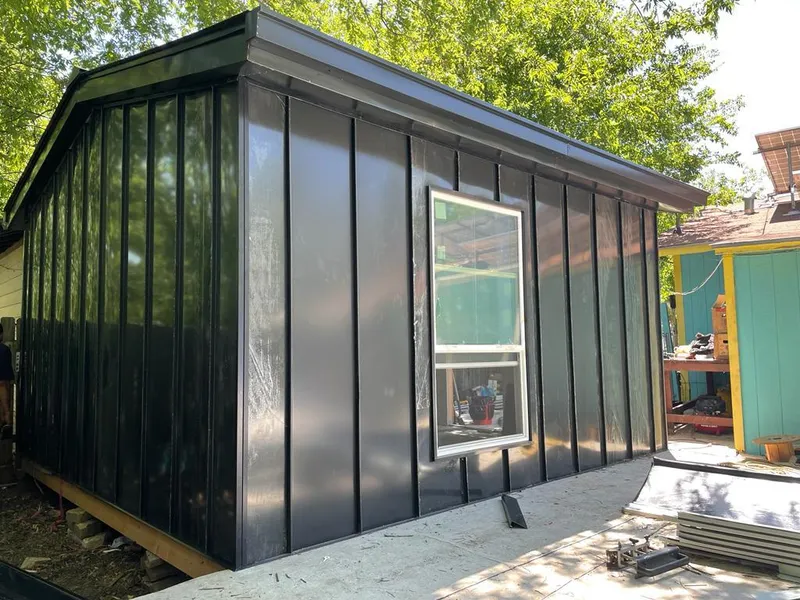 Black standing seam metal wall panels for Roof Inspection in Palmer Town